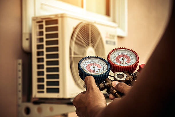 Professional Hvac Maintenance technician working in Helmetta, NJ